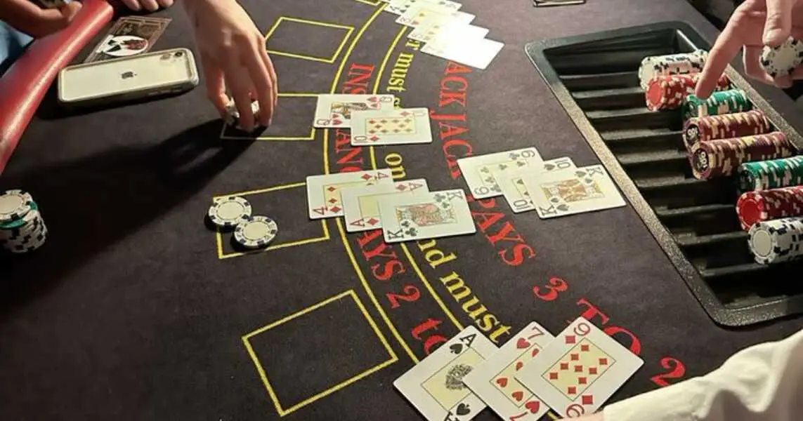 Casino captions for Instagram featuring dice, poker chips, and slot machines on a glamorous casino table